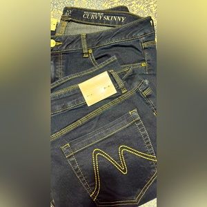 2 pairs New, w/tags. New York & Co Dark rinse jeans. Curvy skinny, 14 average.